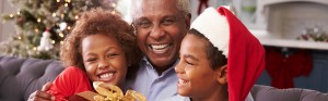 grandfather with grandchildren on Christmans