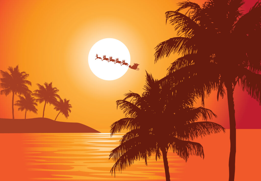 Palm trees with the sun setting and santa's sleigh and reindeer flying in the distance