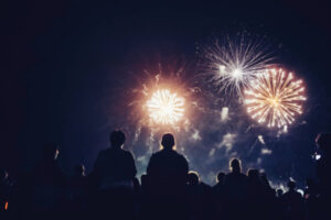 shadows of people watching fireworks
