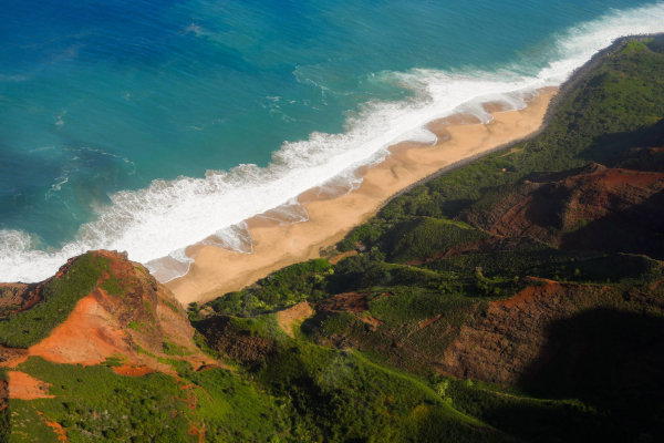 aerial view of kauai mountains and water